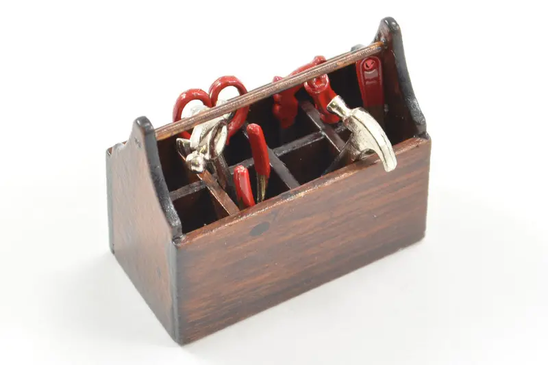 Wood Tool Box With Cast Metal Tools 1